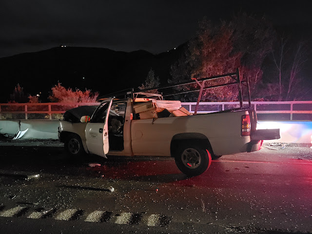 A white pickup truck after crashing into vehicles stopped near a work zone on the evening of Sept. 22 on SR 28 near Rock Island in Douglas County.