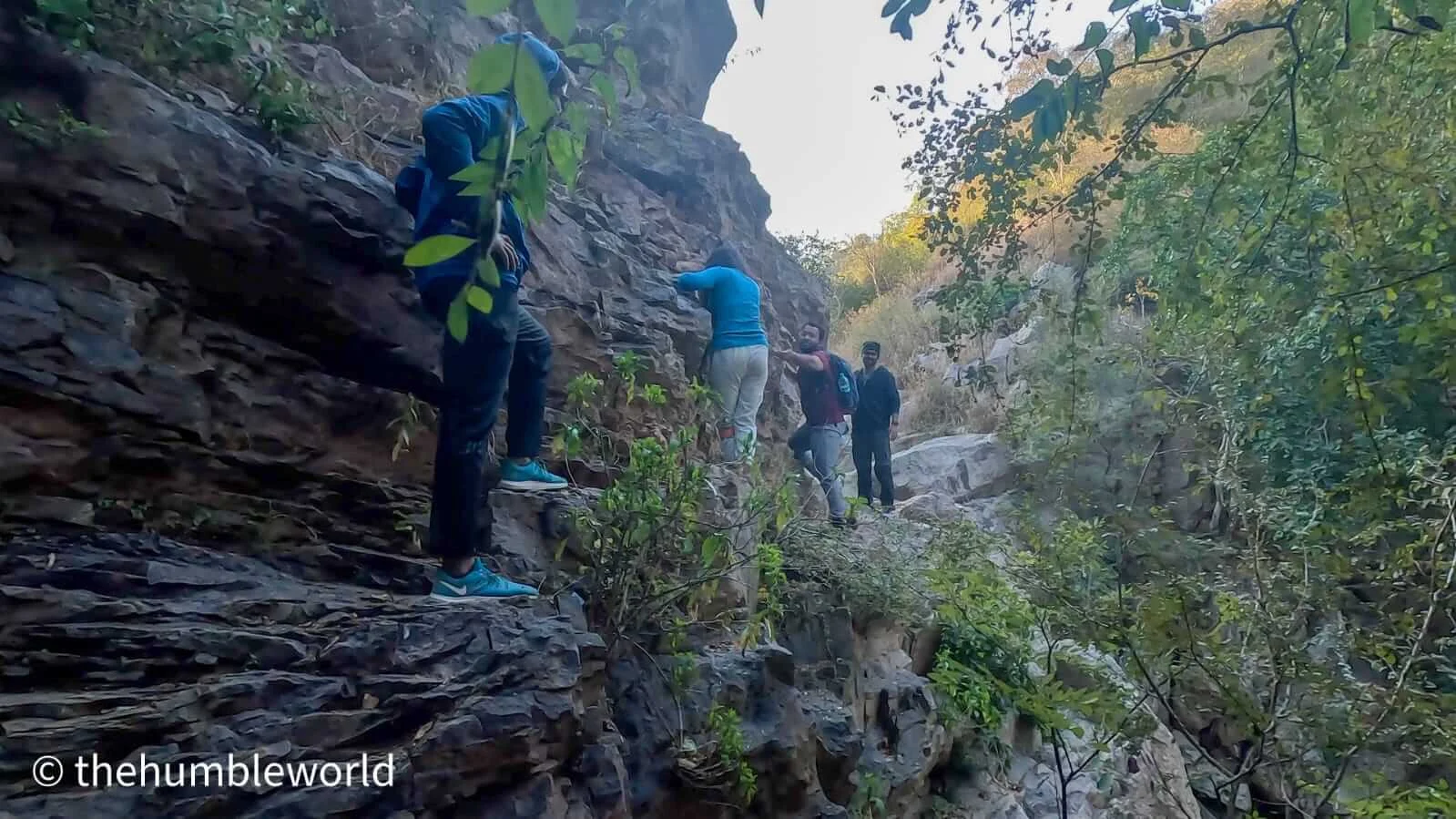 Climbing big rock which we encountered on our trail