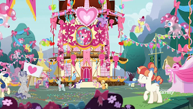 Ponyville decorated in a Pinkie Pie theme including Pinkie balloons, banners, and t-shirts.