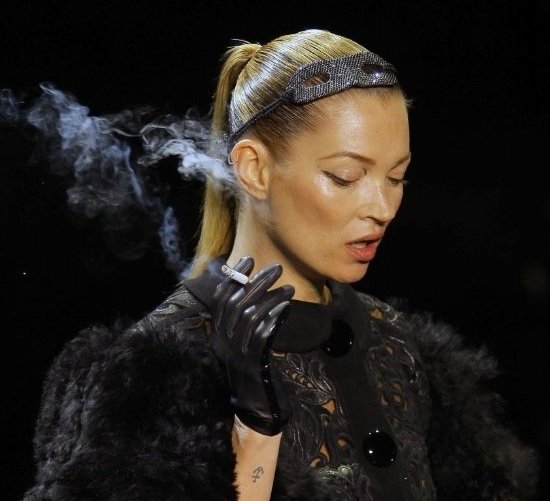 kate moss smoking louis. Kate Moss makes headlines when