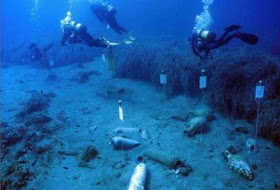 Ingots of orichalcum, Corinthian helmets and amphorae found off the coast of Sicily