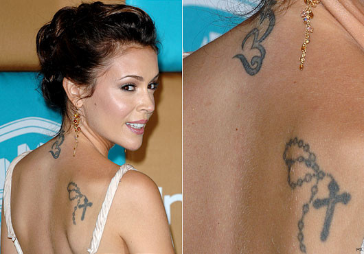 alyssa milano's tattoos Allysa Milano showing off the tattoos on her upper
