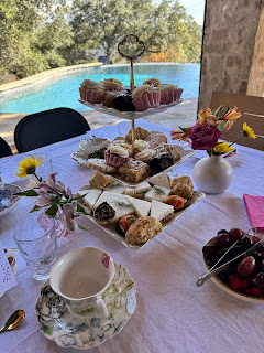poolside Austin afternoon tea party at a private residence, mobile tea party, spicewood tea party, afternoon tea, austin afternoon tea, austin high tea Tiers of delectable afternoon tea treats next to a beautiful fireplace