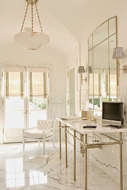 beautiful traditional style decor in a neutral white color palette master bathroom