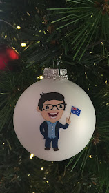 Hand painted Australian citizenship ornament with cartoon man holding Australian man