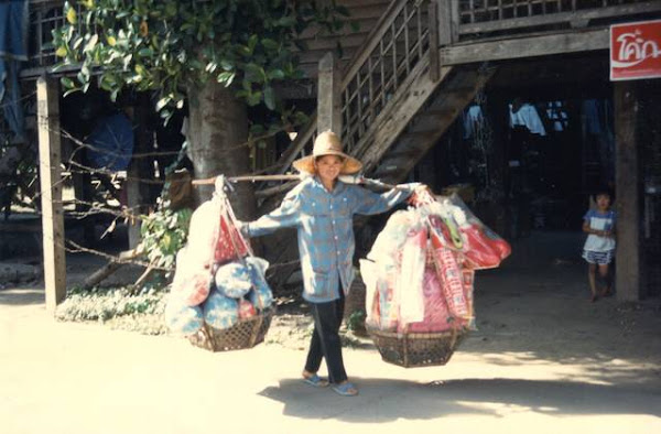 Carrying goods to sell.