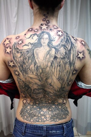 wings on back tattoo. lower ack tattoos wings.