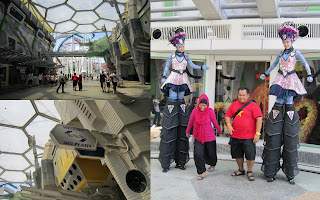 Sci Fi City. Weird things taking photo with a couple. Or the other way ...