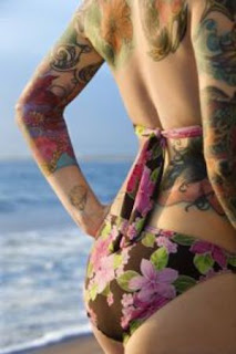 Flower tattoo art design on sexy girl's body