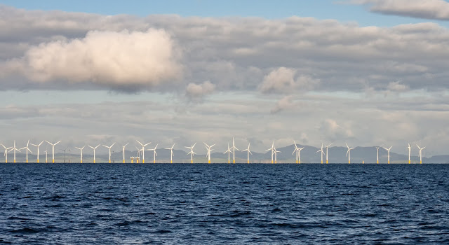 Photo of Robin Rigg Wind Farm taken from a lot closer than we  usually get to it