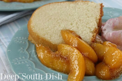 Fresh peaches, tossed in lemon juice and skillet cooked in a buttery, brown sugar sauce with cinnamon, vanilla and a bit of whisky or bourbon, if you like. Shown here with my Grandma Mac's Perfect Pound Cake.