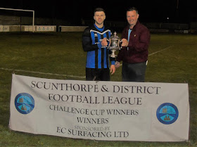 Lee Fielden, right, presenting the Challenge Cup to winners The Butchers Arms at Brigg Town Football Club on April 25, 2019