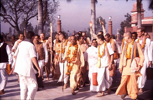 Srila Prabhupada Walks With His Disciples