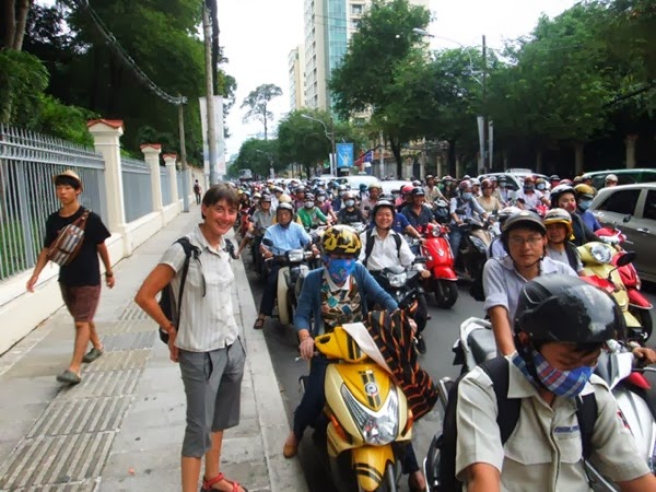Jo posing with the hoards of motorbikes that zip around SAigon.JPG Jo posing with the hoards of motorbikes that zip around SAigon