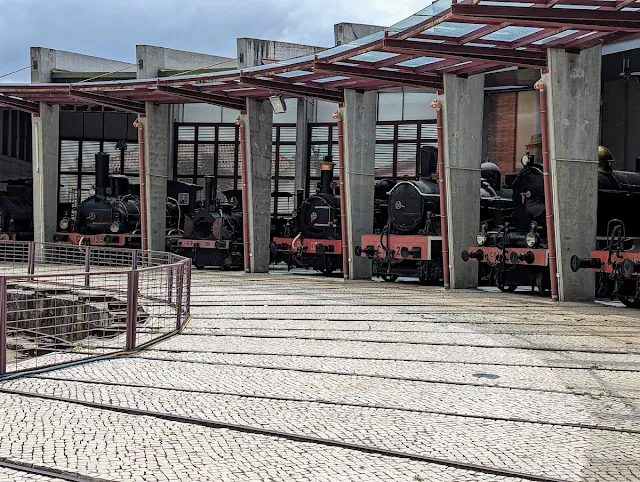 Round House filled with locomotives at the National Railway Museum in Portugal