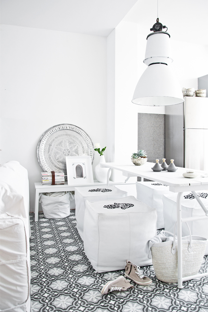 white living room with black & white moroccan tiles
