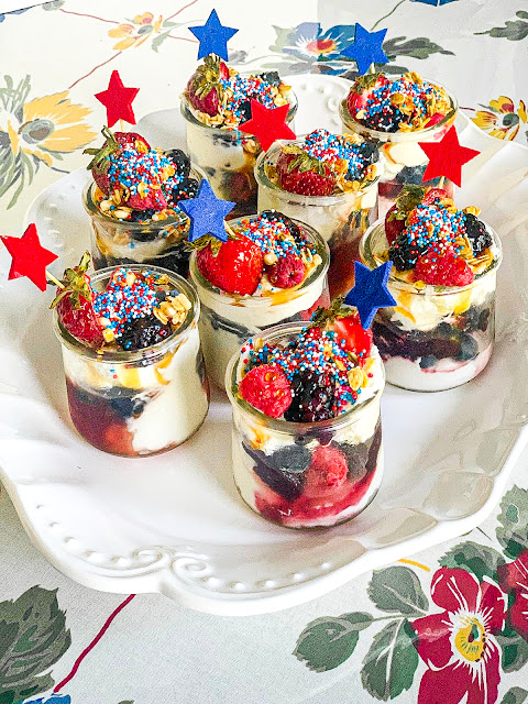 A perfect dessert for summer and cookouts with extreme layers of yumminess. The parfait starts with a spoonful of leftover cheesecake, fresh berries, yogurt, and berry jelly. Don't forget to top it off with a generous spoonful of granola. Did I mention these are extreme?