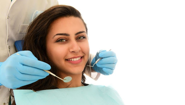 Cleaning and Examine of teeth by dentist