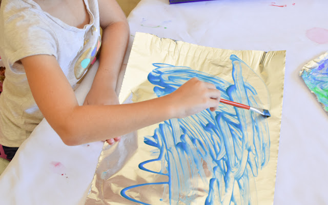 Ocean Foil Painting- make a beautiful sparkling ocean scene with this summer process art.  Fun project for preschool, kindergarten, or elementary.