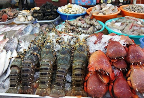 Ăn hải sản bị đau bụng phải xử lý như thế nào?