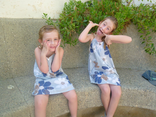 Stephs two girls pulling faces in Spain