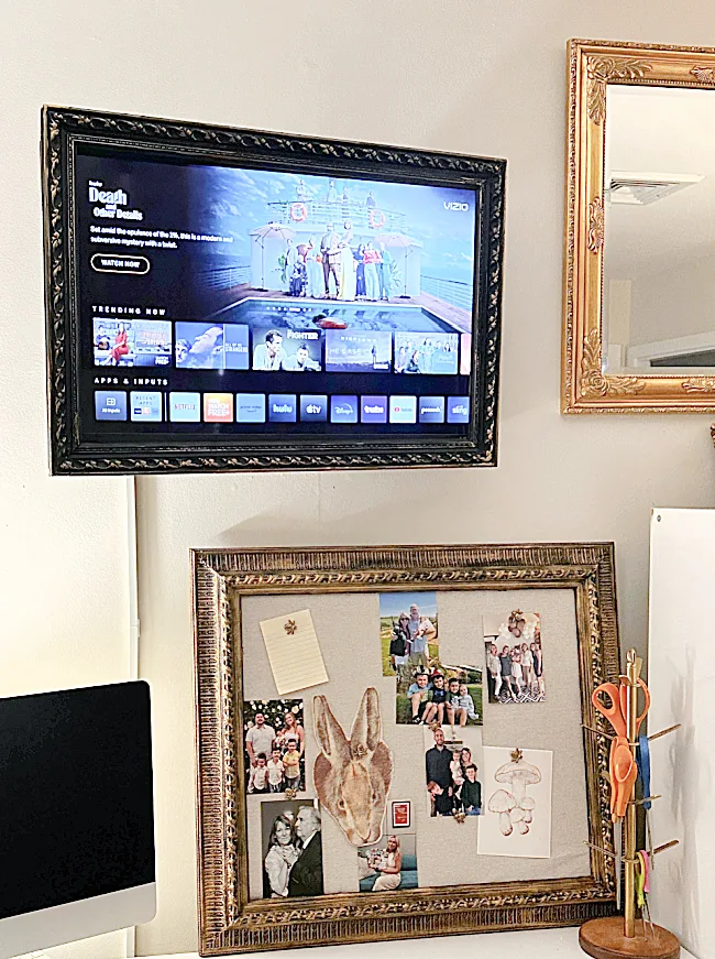 gallery wall with tv in frame