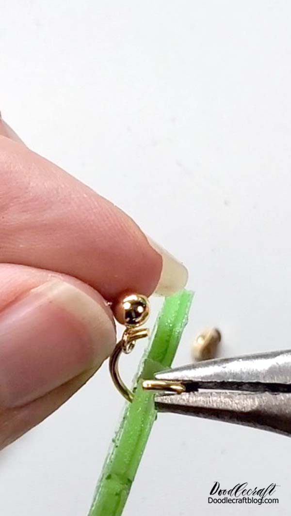 And then slide the earring piece on the jump ring.