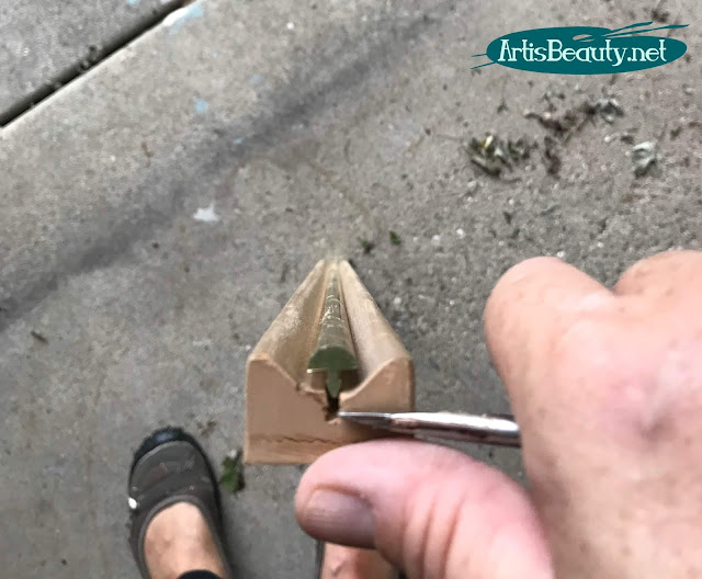 removing brass strip from MCM dresser pull to makeover