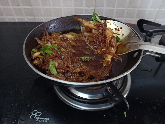 elicious Kozhuva Varuthathu with Curry Leaves - A Spicy and Crispy South Indian Anchovies Fry