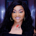 Is Anything wrong with this Mercy AIgbe photo?