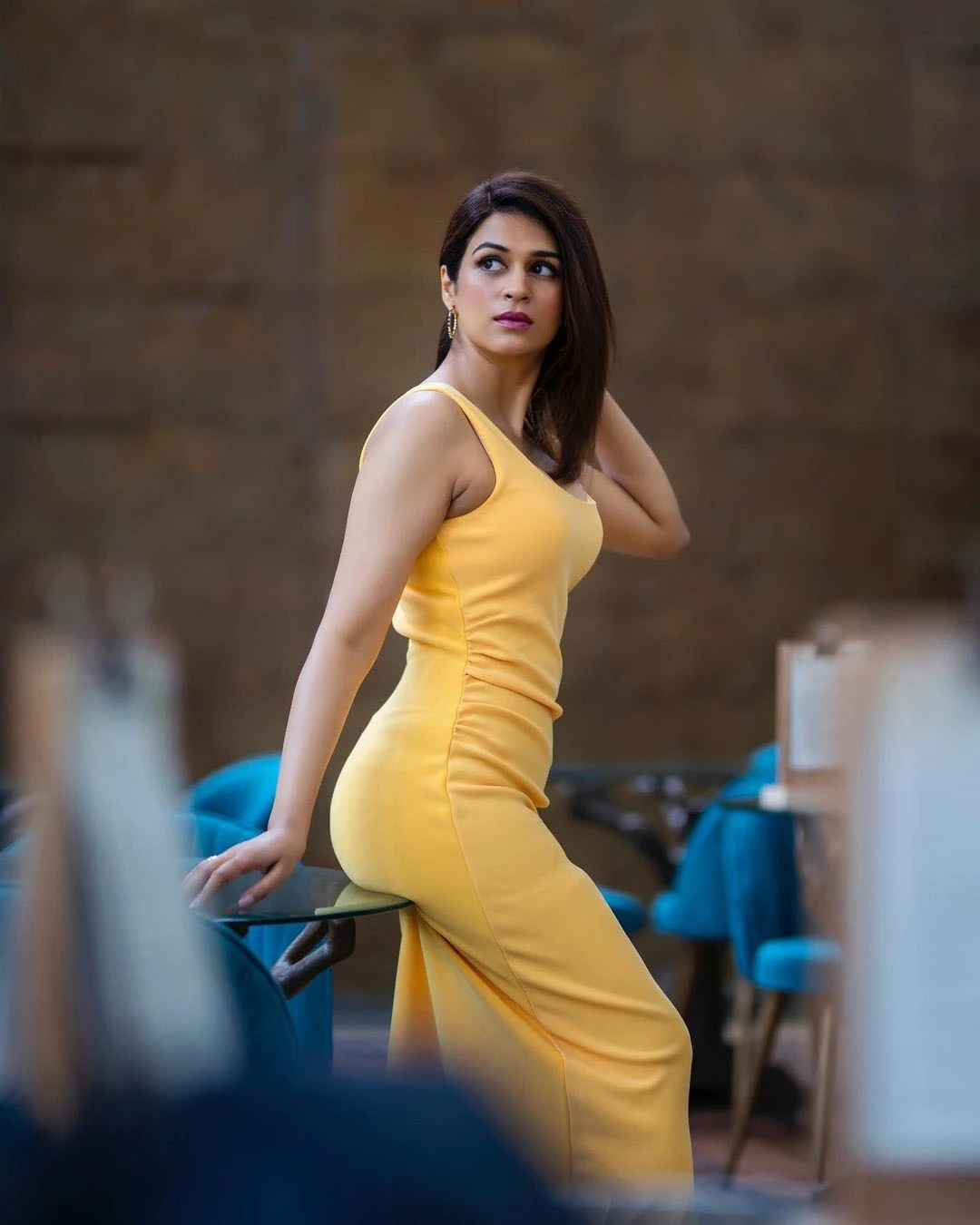 Actress Shraddha Das gorgeous Looks In Yellow Dress