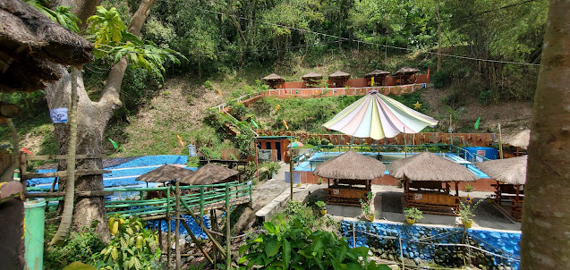 View of cottages and pools