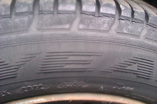 image: car tyre showing the dot code