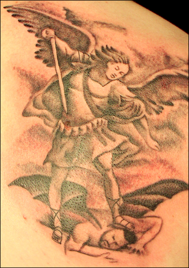 Some people often use angel tattoos designs to display their constant
