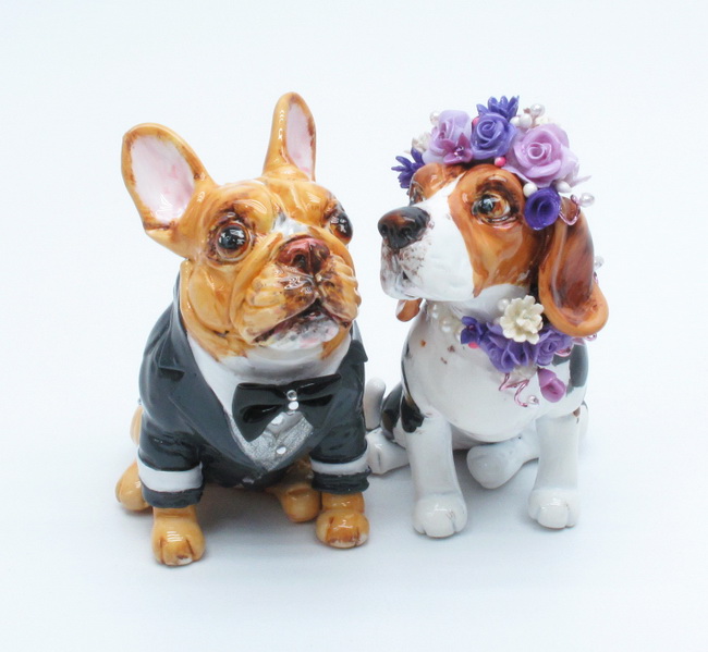 Groom French bulldog wearing gray tuxedo and black bow tie