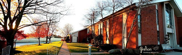 Parking lot view of exterior of Mother of Divine Providence Church