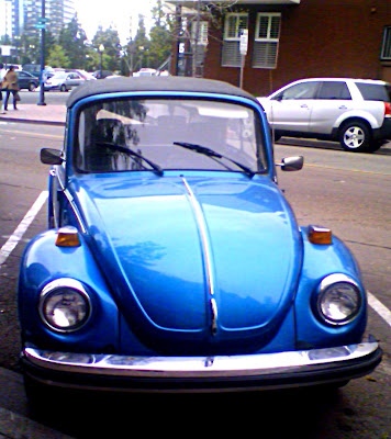 Blue Convertible V. W. Beetle with Karrman Logo