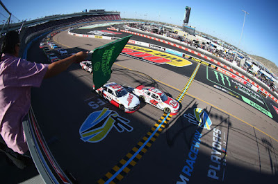 John Hunter Nemechek (#42 Fire Alarm Services Inc. Chevrolet)  and Cole Custer, (#00 Haas Automation Ford) lead the field to the  green flag to start the NASCAR Xfinity Series Whelen Trusted  To Perform 200 at ISM Raceway. 