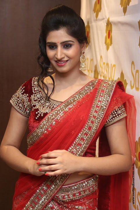 Varshini Sounderajan in red half saree