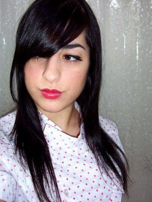 Scene girl hairstyles 2009. Emo girl with Colored Highlights emo hair.