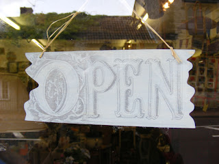 My open sign. I doodled this, but haven't got around to putting closed on the back