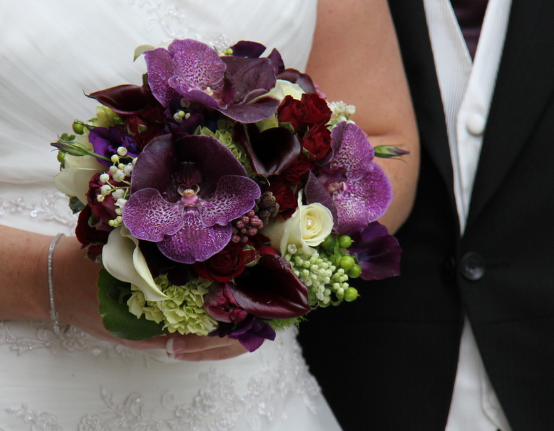 Natalie 39s fabulous deep purple wedding bouquet of Black Magic Vanda 