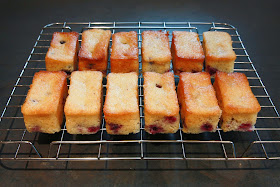 Blackberry and yoghurt mini loaf cakes on a wire cooling rack