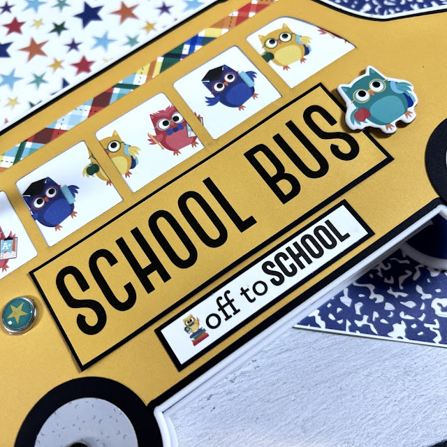 School bus shaped scrapbook album with owls and stars