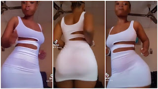 TikTok star Lilkenny flaunts her curves in a white body-con dress as she dances beautifully in a short video