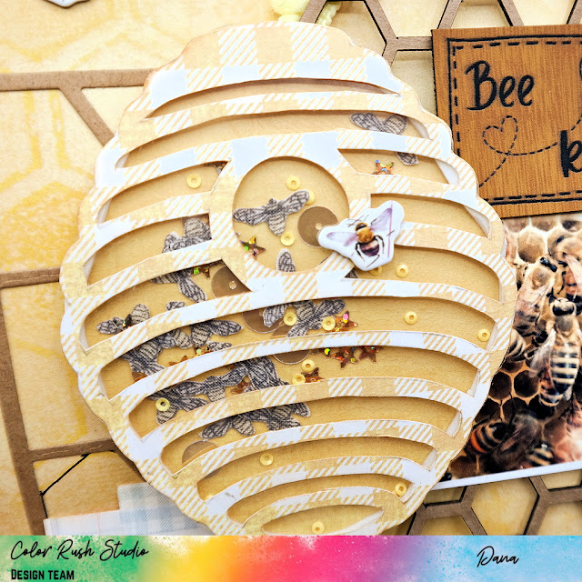 Bee kind scrapbook layout with large chipboard hexagon panel, beehive shaker, and stamped leather embellishments by Dana Tatar for Color Rush Studio.
