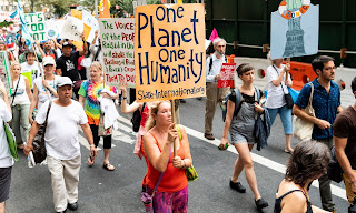  Several thousand people took part in a climate march in New York City on Thursday. Ten activists were arrested after blocking the street in front of Andrew Cuomo’s Manhattan office. (Photograph Credit: Michael Brochstein/SOPA Images/REX/Shutterstock) Click to Enlarge.