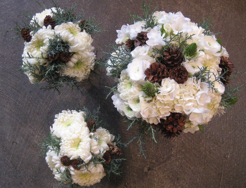 Some pictures of floral pieces for a recent winter white and ice wedding