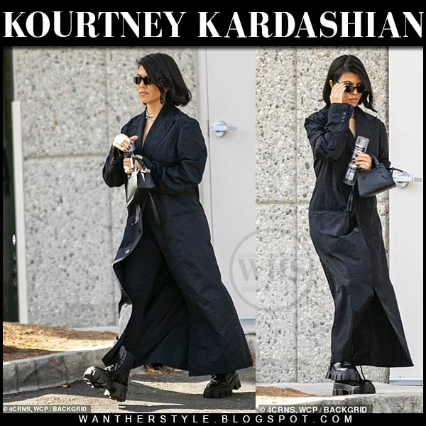 Kourtney Kardashian in long black coat and black Prada combat boots