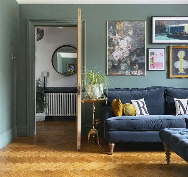 sage green and blue living room